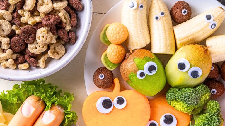 Fruit, vegetables, sausages and muesli with googly eyes for Rapunzel for breakfast.